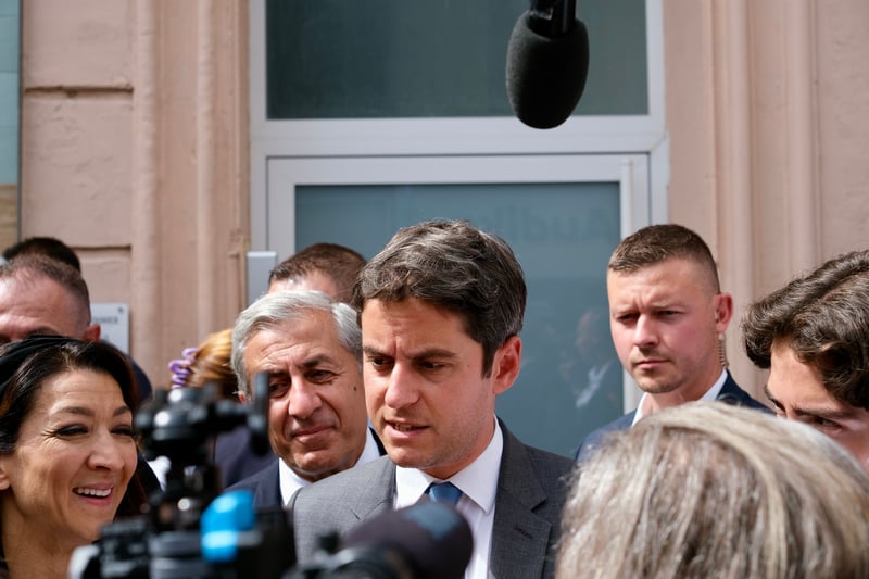 attal talks to reporters in marseille