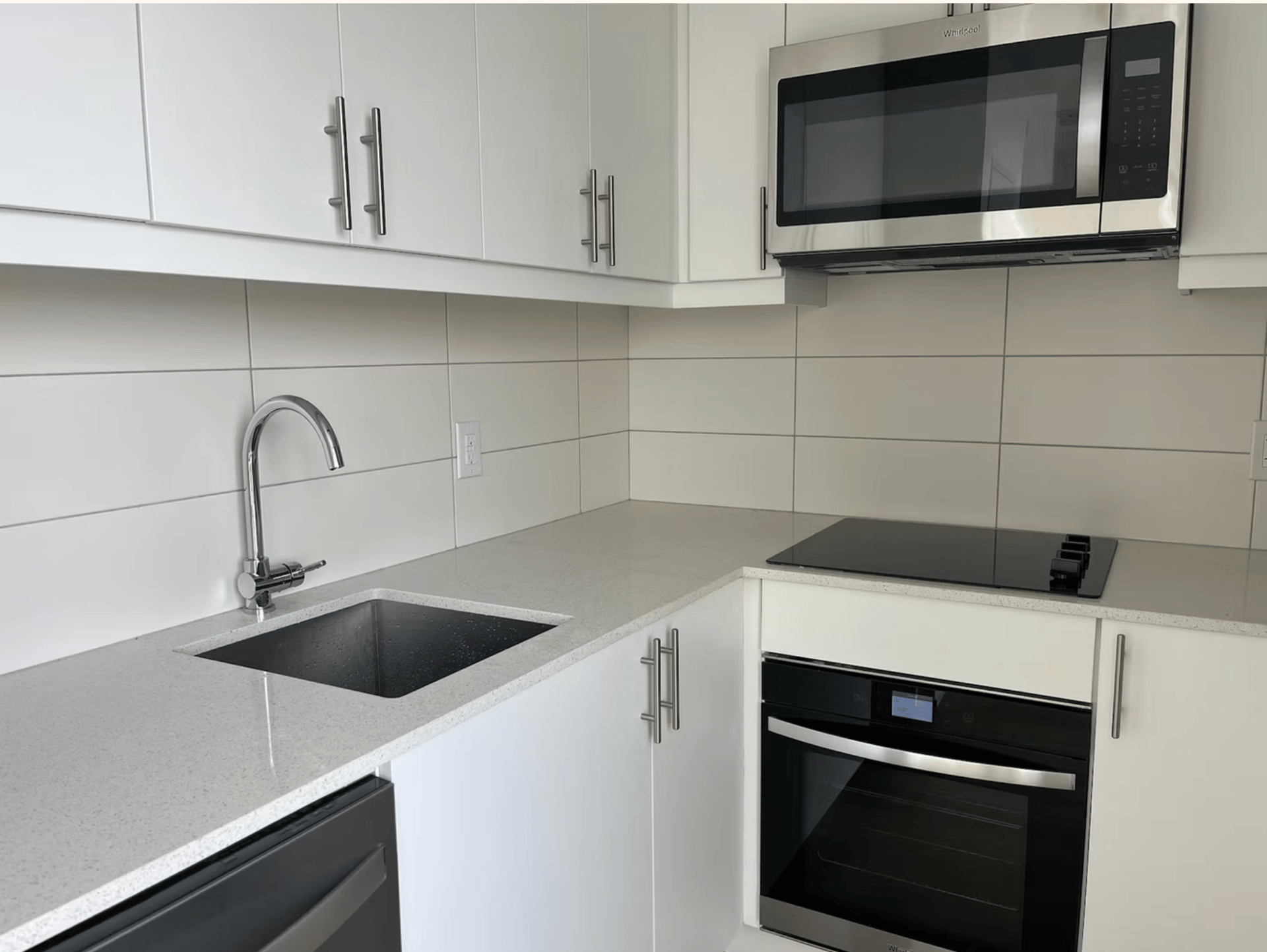 Residential kitchen renovation with updated cabinetry and countertops