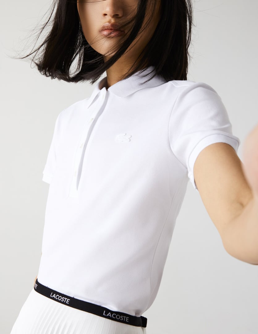 LACOSTE WOMAN ΜΠΛΟΥΖΑ ΠΟΛΟ ΠΙΚΕ ΜΕ ΚΕΝΤΗΜΕΝΟ LOGO ΕΜΠΡΟΣ SLIM FIT