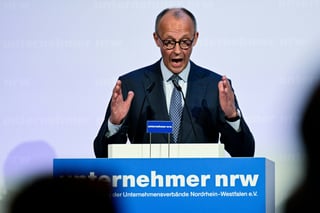 Merz Defends Coalition Reforms and Demands SPD Cooperation