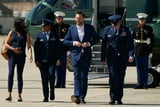 US and Iran set for new talks after delay and deadly strikes