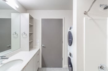 Robins Nest apartment living room in Seattle, WA - bright rental space with wood floor and windows.