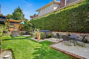 East Highland Apartments, Seattle, WA: bright 1-bedroom unit with open living area and modern kitchenette.