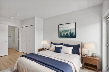 a bedroom with a bed and a closet