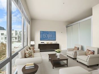 Bright living room with large windows in a Seattle, WA rental at 509 1st Ave.