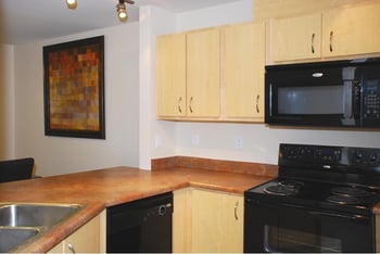 Sunny living room at Chianti Apartments, Renton, WA; open layout, modern finishes, ideal for renters.