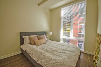 Larson Building Seattle apartment living room with modern finishes and bright natural light