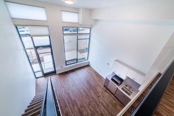 Interior of Lillehammer Apartments, Seattle, WA; bright rental living space with contemporary finishes.