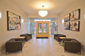 Larson Building Seattle apartment living room with daylight, modern finishes, for rent.