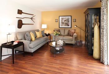 Bright living room at Champagne at Bellevue apartment in Bellevue, WA with modern furniture and natural light.