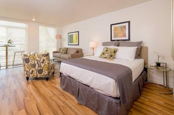 Bedroom with a bed and natural light