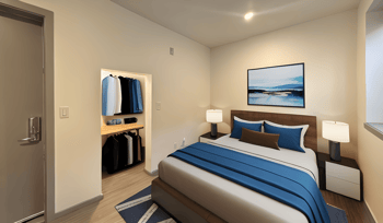 a bedroom with a bed in a hotel room