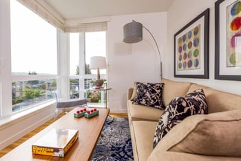 Living room with seating and a view