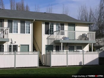 Bright living room in apartment at The Park at Fife, Fife, WA - open layout with large windows