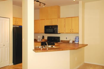 Bright living room in a Chianti Apartments unit, Renton, WA.