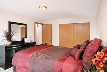 Bright living room at The Park at Fife, rental apartment in Fife, WA with hardwood-like floors and large window.