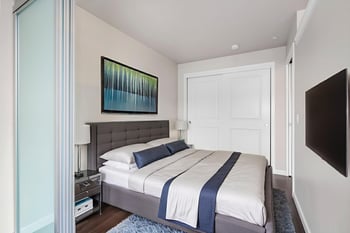 Ludwig Apartments, Seattle: bright living room with large windows and contemporary kitchenette for rent.