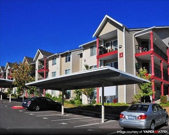 Chianti Apartments, Renton, WA – bright living room with large windows and modern decor, ideal for rent.