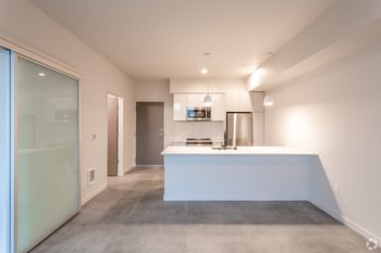 Robins Nest apartment interior in Seattle, WA – bright living area for rental listing.