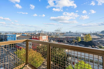 the view of the city from the balcony of Harbor Flats