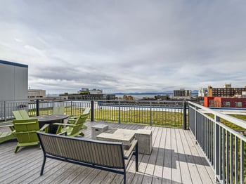 Bright living room in a Seattle apartment at 509 1st Ave, Seattle, WA, with modern furnishings.