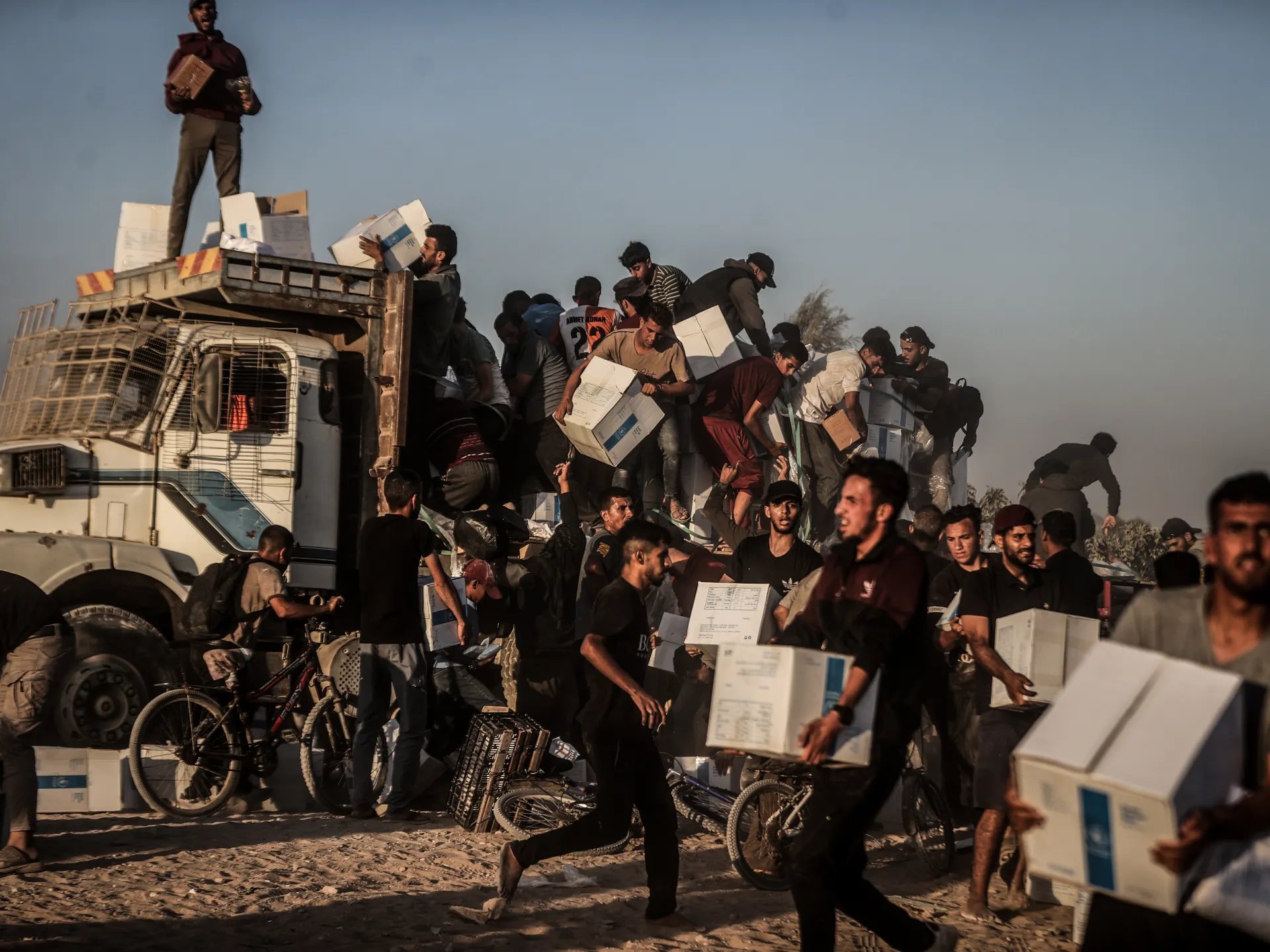 Aid trucks near Gaza blockade amid humanitarian crisis, 2025 Humanitarian aid trucks attempting delivery near Gaza blockade in 2025