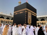Jeffrey Epstein and UAE billionaire Sultan Ahmed bin Sulayem stand over a sacred Kaaba Kiswa tapestry laid on the floor of Epstein's New York townhouse in 2014