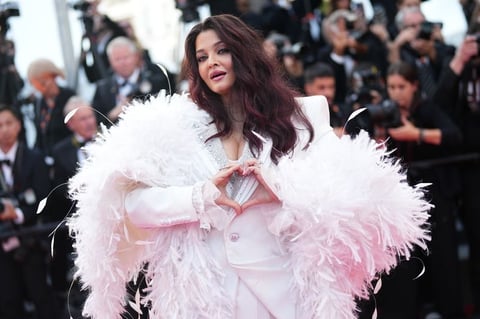 Aishwarya Rai Bachchan in a white structured suit at the closing ceremony of the 79th Cannes Film Festival