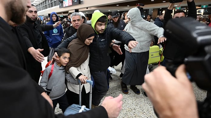 ISIS-linked Australian women and children arrive at Melbourne Airport after returning from Syria