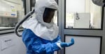 Laboratory technologist in protective equipment at Uganda Virus Research Institute in Entebbe Uganda during Ebola outbreak 2026