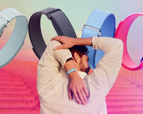 Google Fitbit Air screenless AI fitness tracker worn during workout