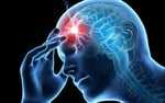 Person experiencing a migraine headache holding their head in pain