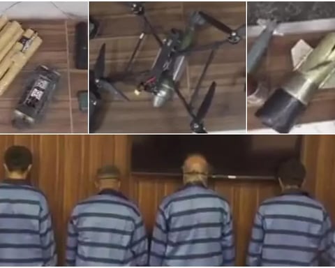 Iranian intelligence forces display weapons and communication devices seized from alleged foreign-backed sabotage suspects in Fars province