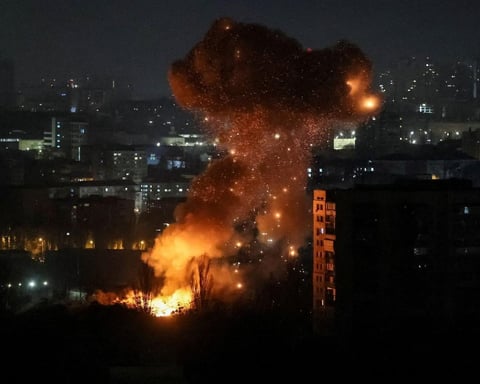 Russian missile and drone attack lights up the sky over Kyiv after Putin vows retaliation over Luhansk strike