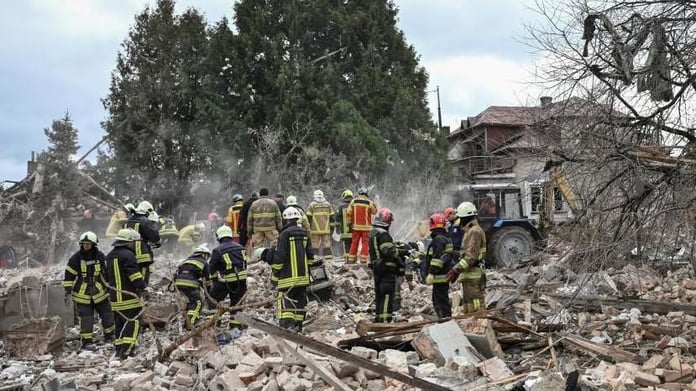 Firefighters respond after Russian missile and drone strikes hit Zaporizhzhia ahead of Victory Day celebrations in Moscow