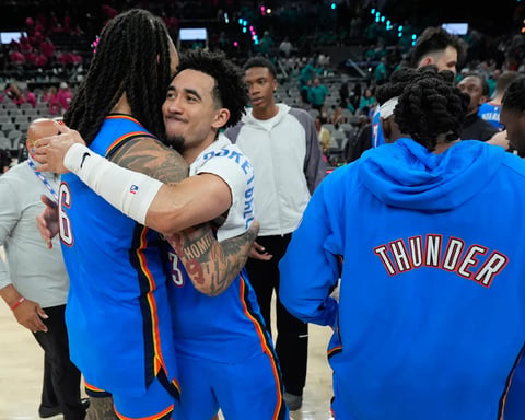 Shai Gilgeous-Alexander celebrates with Oklahoma City Thunder teammates during Game 3 against the San Antonio Spurs in the Western Conference Finals