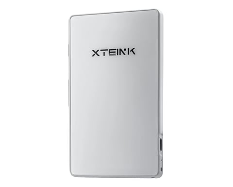 Xteink X4 tiny magnetic e-reader attached to smartphone showing e-ink display