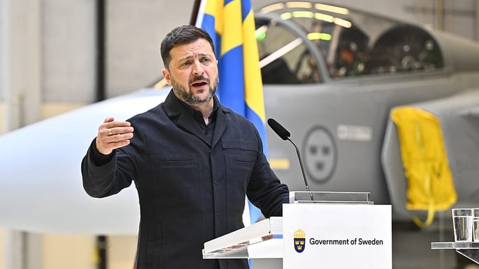 Ukrainian President Volodymyr Zelenskyy speaks at joint press conference at F-16 air flotilla base in Uppsala Sweden