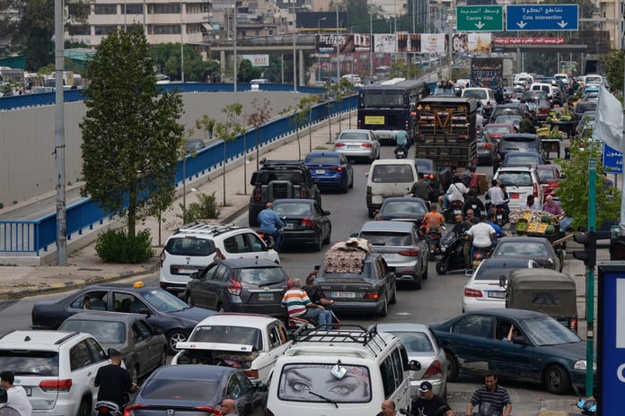 Cars in traffic on a Beirut highway as residents flee following Israeli threat to strike Dahiyeh, Lebanon, June 1, 2026