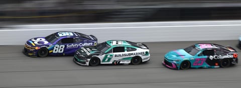 NASCAR cars racing at Michigan International Speedway during the 2026 FireKeepers Casino 400