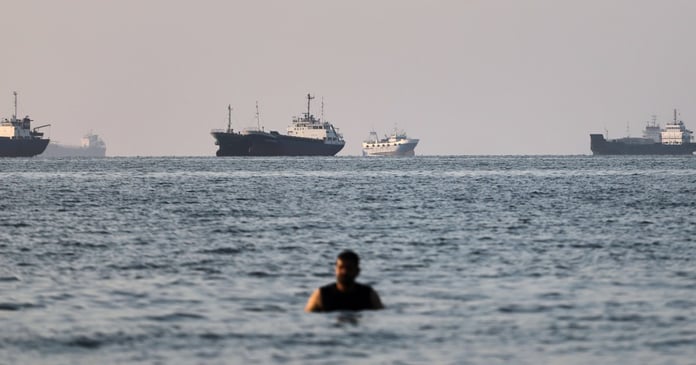 Vessels stranded near the Strait of Hormuz as the US and Iran negotiate a toll-free shipping agreement in June 2026
