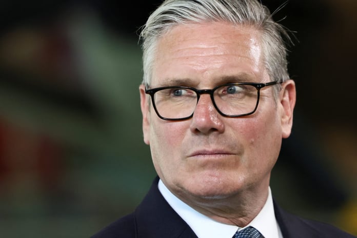 Keir Starmer at a signing ceremony as Mandelson files Epstein crisis deepens