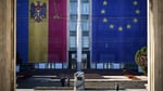 Moldova and EU flags draped on the government building in Chisinau, September 2025