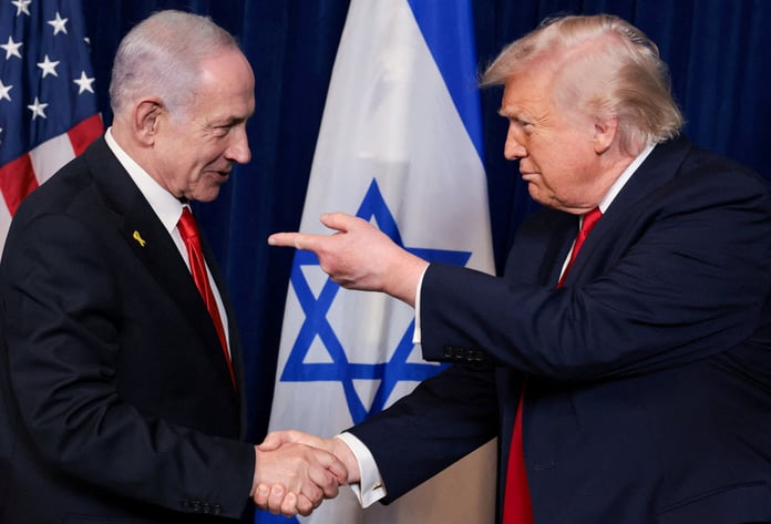 Trump shakes hands with Netanyahu at Mar-a-Lago press conference December 2025