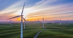 Wind turbines in the UK as Britain's net zero economy surpasses £105 billion in annual value
