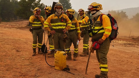 Firefighters battling wildfires in southern France during the fourth heatwave of 2026
