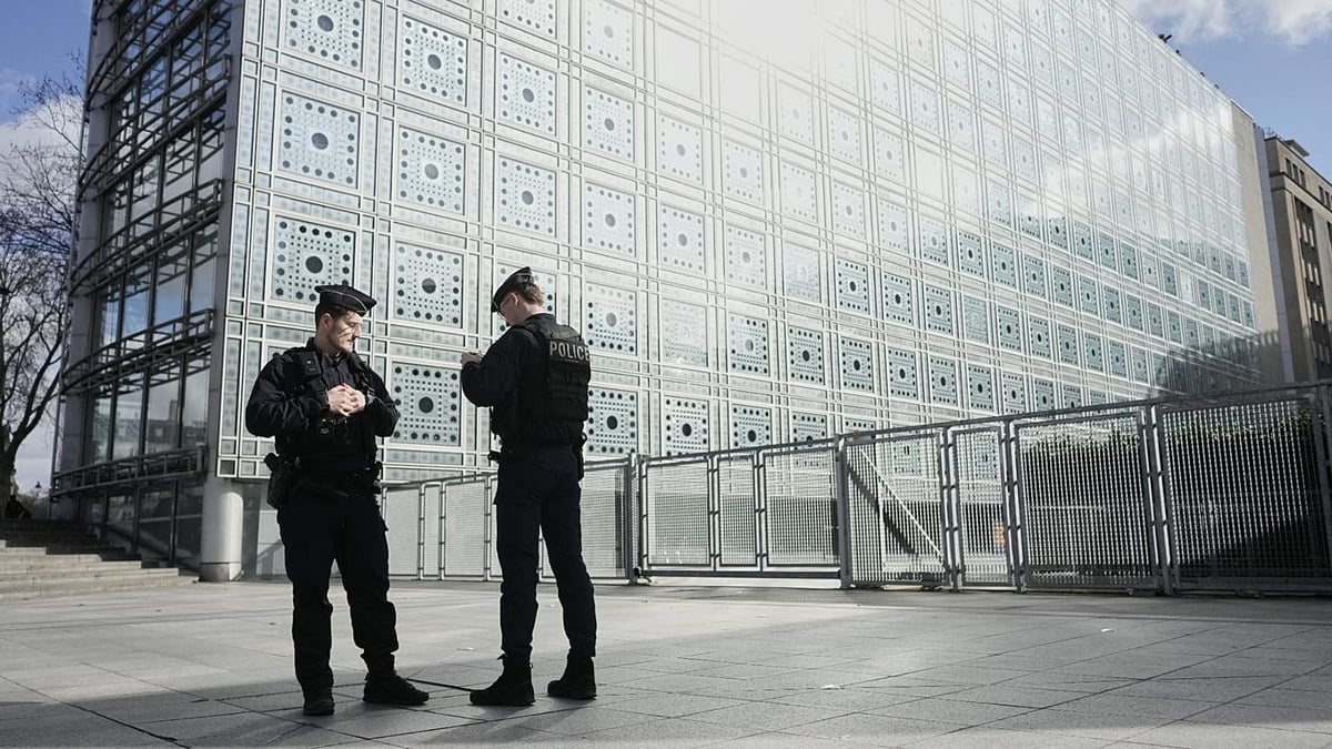 French police outside Arab World Institute Paris during Epstein network investigation February 2026