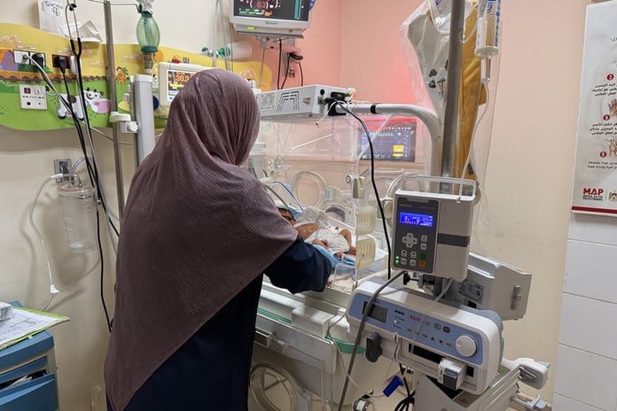 Medical staff at Al-Aqsa Martyrs Hospital in Deir el-Balah working under power cuts amid Gaza crisis