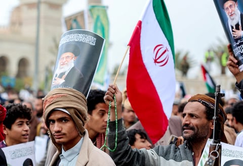 Houthi supporter at Sanaa rally as Yemen conflict escalates in 2026