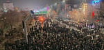 Amnesty International sign at protest calling for halt to Iran executions of January 2026 uprising detainees
